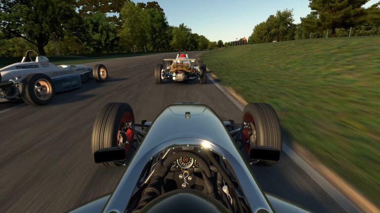 iRacing cockpit view entering a slow corner, showing steering wheel and dashboard