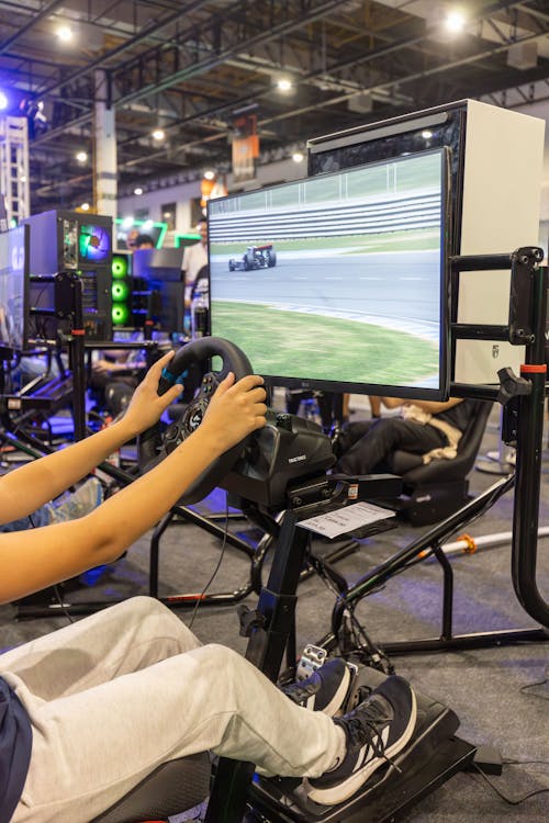 Sim racer working to improve iRating in iRacing with a racing simulator setup