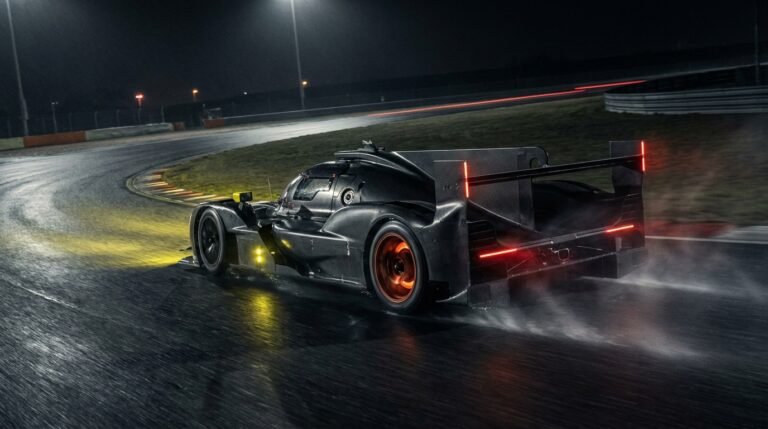 iRacing prototype race car at night, sim racing with bass shaker setup