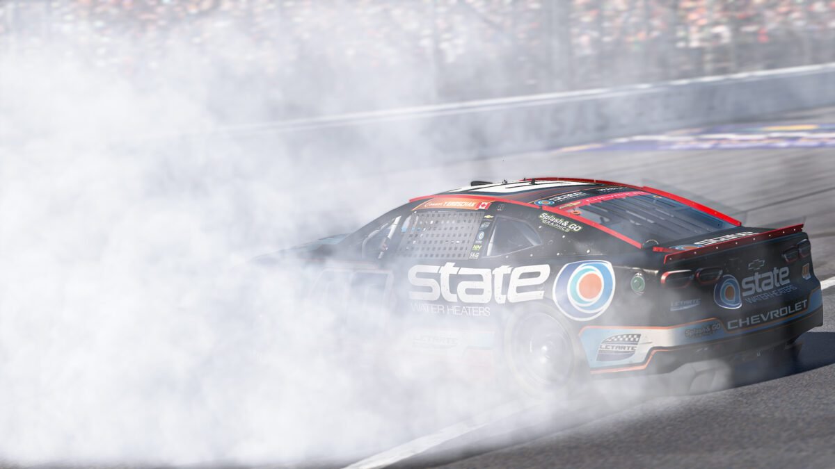 Connor Yeroschak celebrates after winning the eNASCAR Coca-Cola iRacing Series race at Kansas Speedway 2026